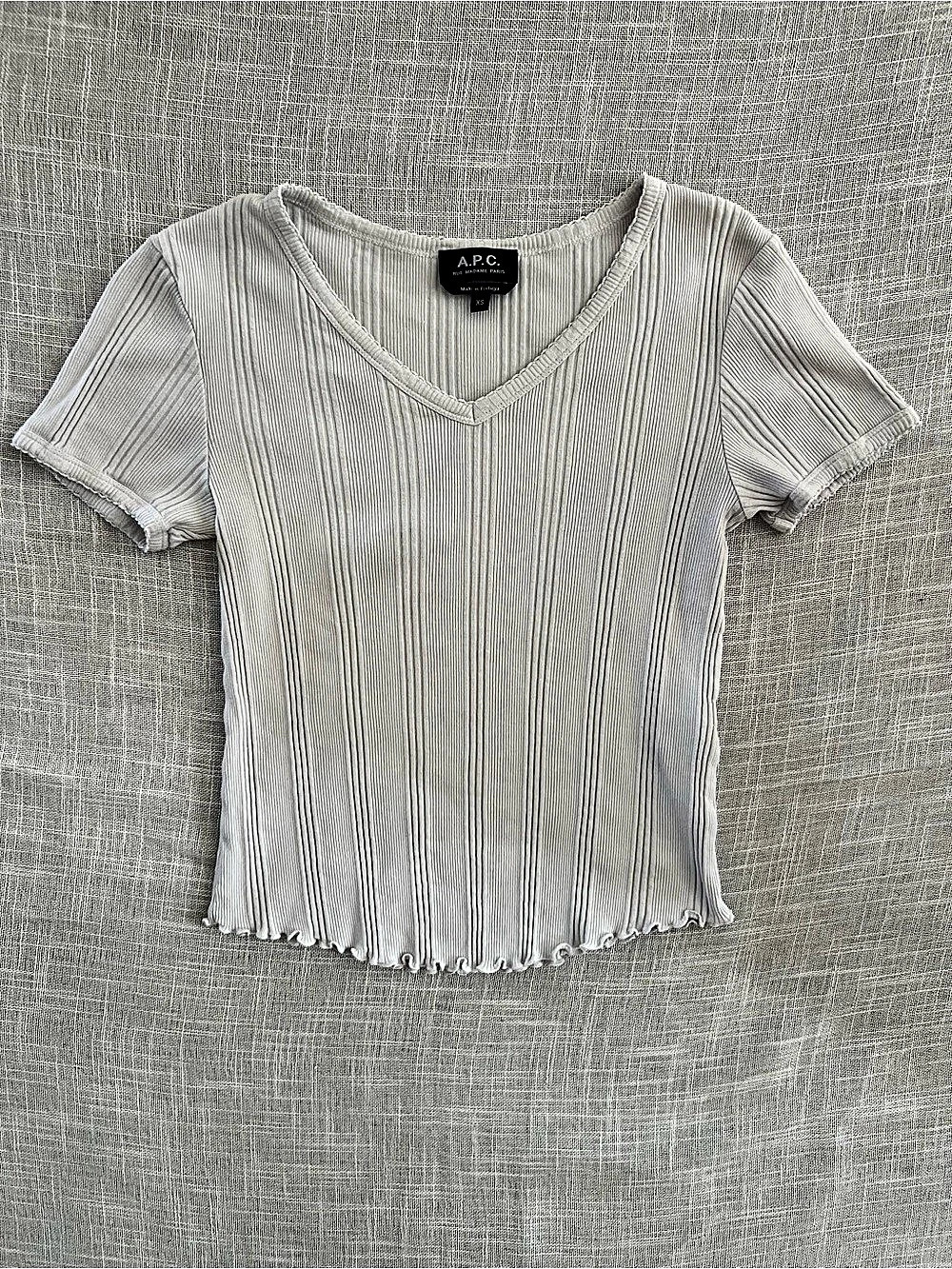 A.P.C. Ribbed V-Neck Short Sleeve Top in a Size XS. Raw lettuce edge hem.